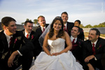 <strong>Weddings</strong><br /> The bride with the admiring groomsmen.